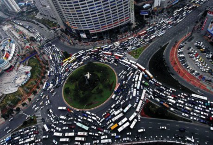 photograph of traffic in a  French roundabout